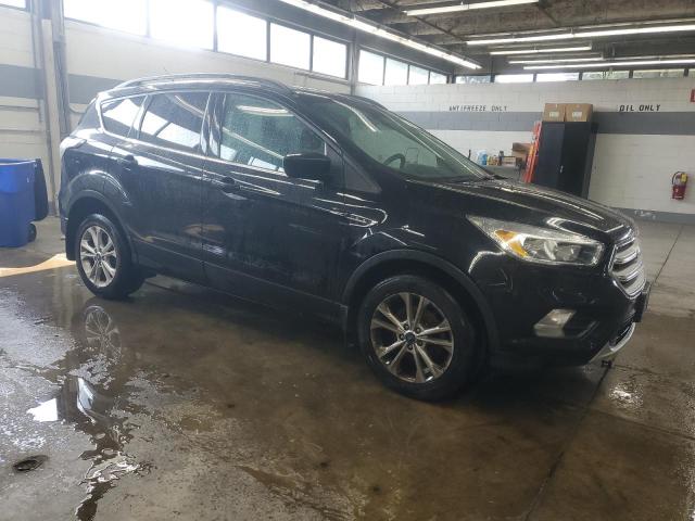 Photo 4 from auction – 2018 FORD ESCAPE SE with VIN 1FMCU0GD8JUC92545