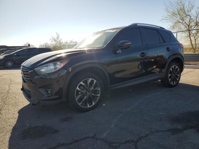 MAZDA CX-5 TOURI 2016 with VIN JM3KE2CY4G0789309 - Photo from auction