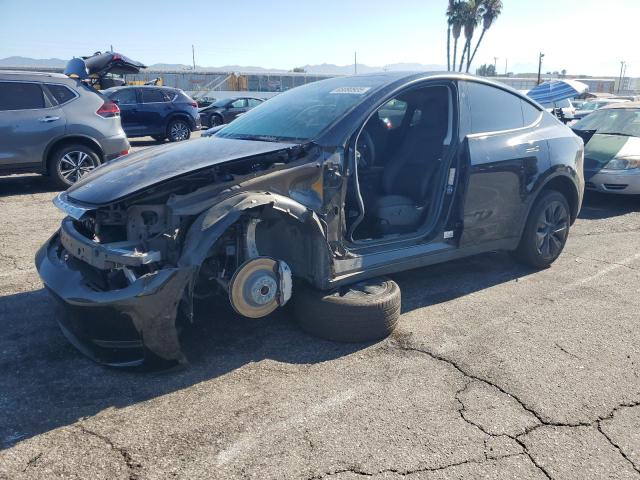 TESLA MODEL Y 2024 with VIN 7SAYGDED8RF122205 - Photo from auction