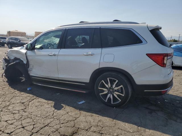 Photo 2 from auction – 2021 HONDA PILOT ELIT with VIN 5FNYF6H08MB091261