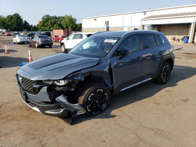 MAZDA CX-50 BASE 2023 with VIN 7MMVABXY6PN135443 - Photo from auction