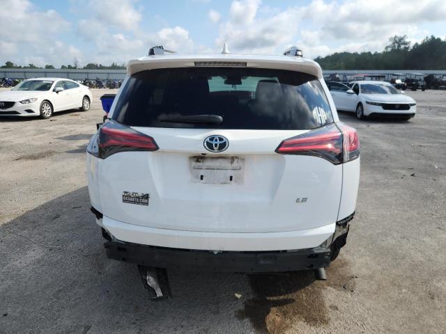 Photo 6 from auction – 2017 TOYOTA RAV4 LE with VIN 2T3ZFREV6HW354210