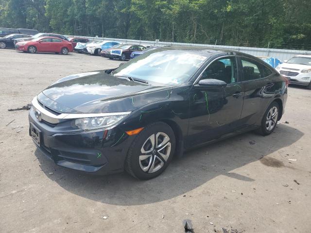 HONDA CIVIC LX 2018 with VIN 2HGFC2F55JH572809 - Photo from auction