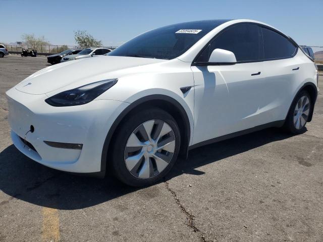 TESLA MODEL Y 2023 with VIN 7SAYGDEE9PF869303 - Photo from auction