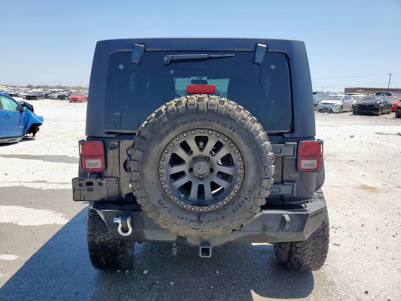 Photo 6 from auction – 2014 JEEP WRANGLER U with VIN 1C4BJWFG1EL164795