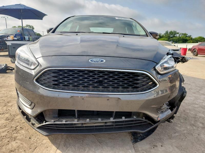 Photo 5 from auction – 2015 FORD FOCUS SE with VIN 1FADP3F22FL219627