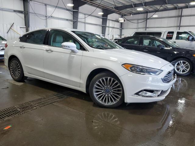 Photo 4 from auction – 2017 FORD FUSION TIT with VIN 3FA6P0K94HR158912