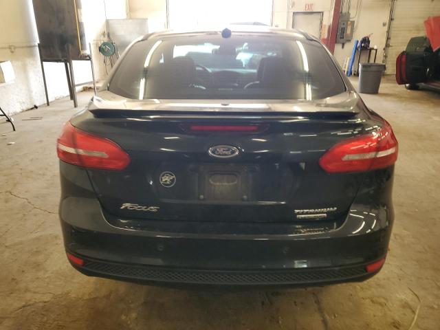 Photo 6 from auction – 2015 FORD FOCUS TITA with VIN 1FADP3J24FL348993