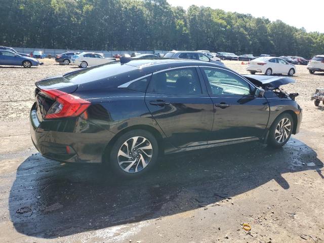 Photo 3 from auction – 2018 HONDA CIVIC EX with VIN 2HGFC2F78JH557447