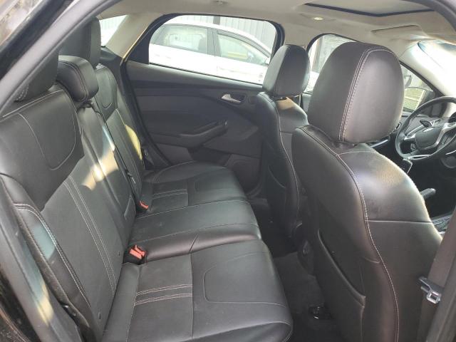 Photo 10 from auction – 2014 FORD FOCUS TITANIUM with VIN 1FADP3J2XEL241588