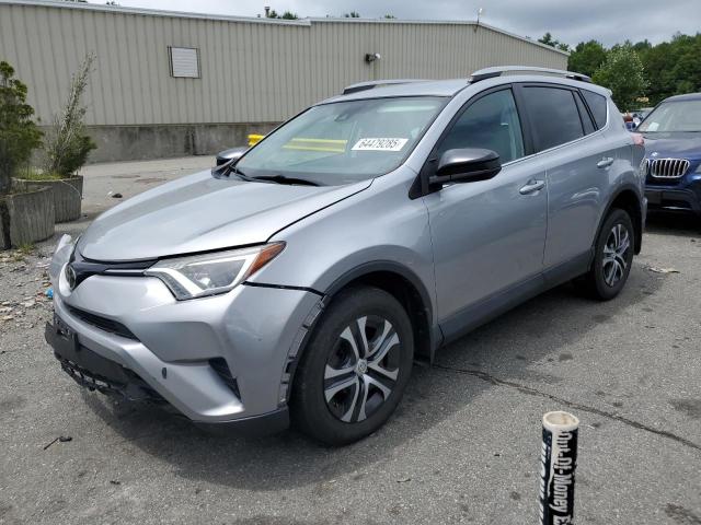 TOYOTA RAV4 LE 2018 with VIN 2T3BFREV6JW755103 - Photo from auction