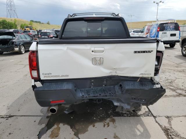 Photo 6 from auction – 2023 HONDA RIDGELINE with VIN 5FPYK3F8XPB011781