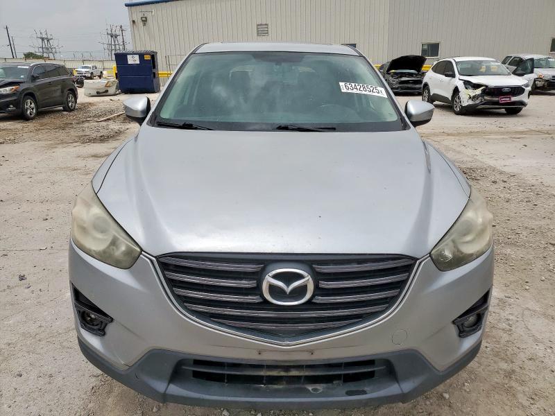 Photo 5 from auction – 2016 MAZDA CX-5 TOURI with VIN JM3KE2CYXG0828419