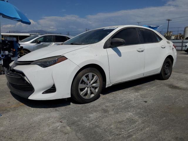 TOYOTA COROLLA L 2018 with VIN 5YFBURHE7JP825090 - Photo from auction