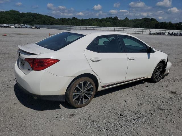Photo 3 from auction – 2017 TOYOTA COROLLA L with VIN 5YFBURHE0HP734432
