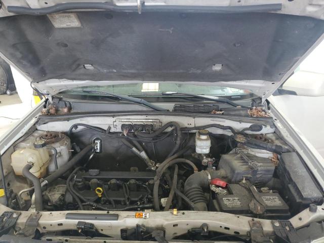 Photo 12 from auction – 2009 FORD ESCAPE LIM with VIN 1FMCU04779KD08658