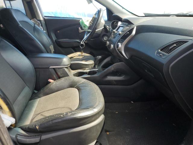 Photo 7 from auction – 2012 HYUNDAI TUCSON GLS with VIN KM8JUCAC0CU418764