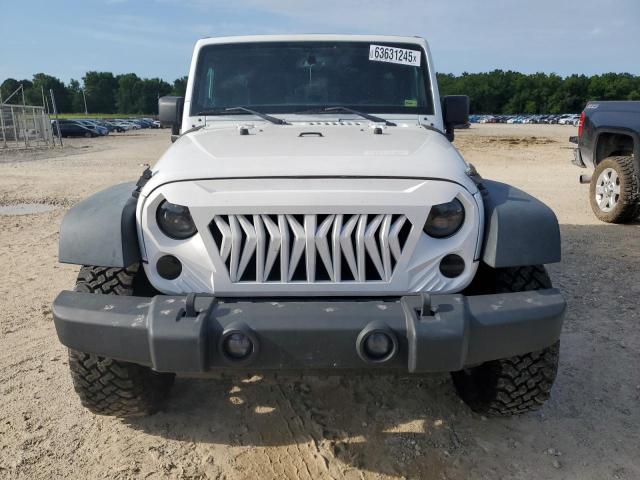 Photo 5 from auction – 2014 JEEP WRANGLER U with VIN 1C4BJWDG0EL119852