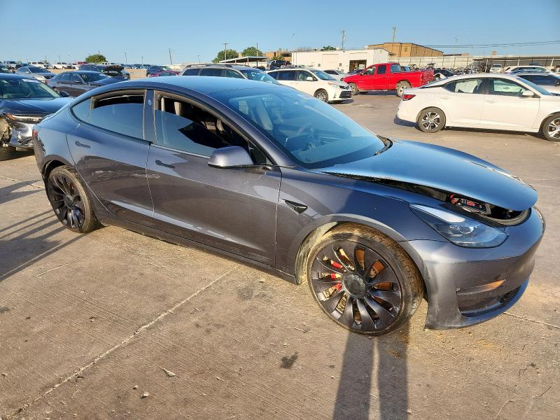 Photo 4 from auction – 2021 TESLA MODEL 3 with VIN 5YJ3E1EC8MF043970