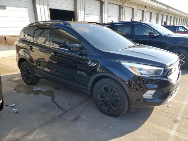 Photo 4 from auction – 2018 FORD ESCAPE SE with VIN 1FMCU9GDXJUC30648