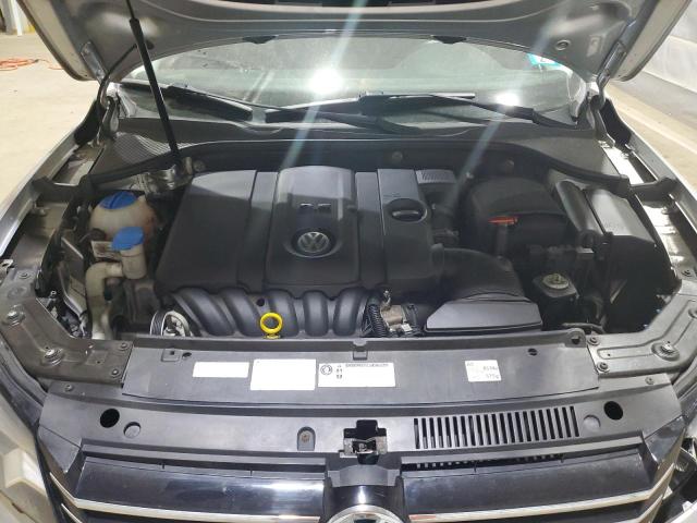 Photo 11 from auction – 2014 VOLKSWAGEN PASSAT S with VIN 1VWAP7A39EC018128
