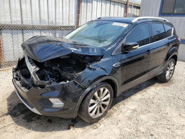 FORD ESCAPE TIT 2017 with VIN 1FMCU0J90HUE48236 - Photo from auction