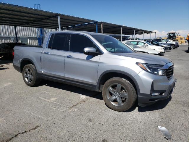Photo 4 from auction – 2023 HONDA RIDGELINE with VIN 5FPYK3F76PB035180