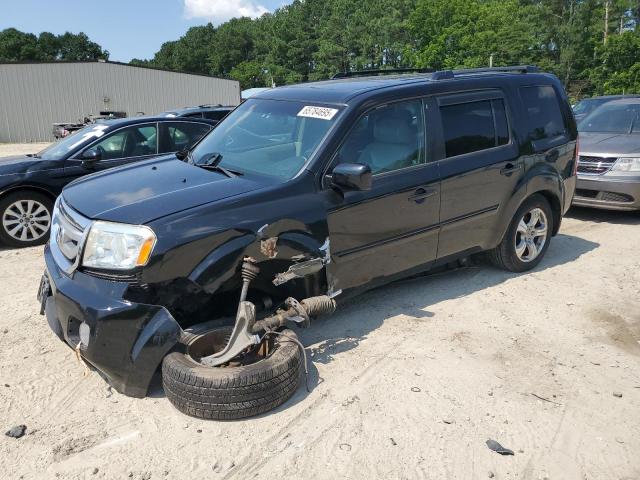 HONDA PILOT EXL 2011 with VIN 5FNYF4H5XBB048263 - Photo from auction