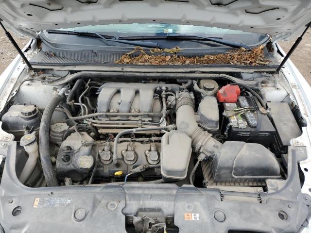 Photo 11 from auction – 2014 FORD TAURUS POL with VIN 1FAHP2L87EG159551