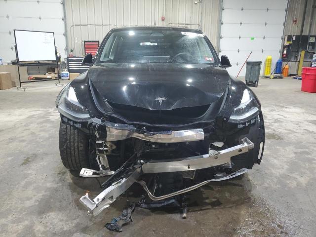 Photo 5 from auction – 2022 TESLA MODEL Y with VIN 7SAYGDEF1NF545722