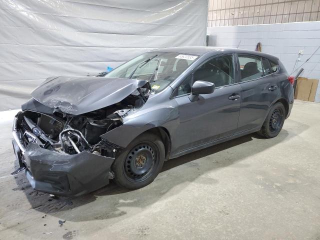 SUBARU IMPREZA 2018 with VIN 4S3GTAA62J3747646 - Photo from auction