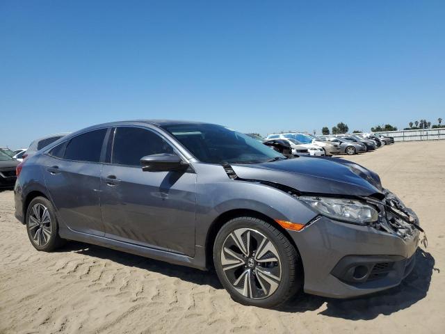 Photo 4 from auction – 2018 HONDA CIVIC EX with VIN JHMFC1F39JX037550