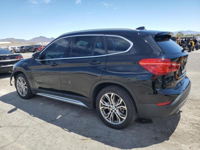 Photo 2 from auction – 2016 BMW X1 XDRIVE2 with VIN WBXHT3Z33G4A48321