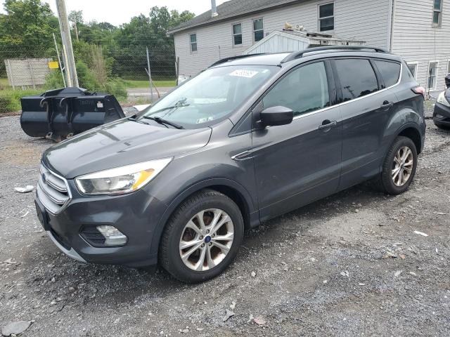 FORD ESCAPE SE 2018 with VIN 1FMCU0GD7JUA02344 - Photo from auction