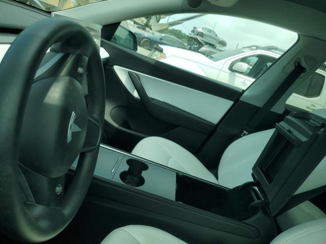Photo 8 from auction – 2022 TESLA MODEL Y with VIN 7SAYGDEE7NF367290