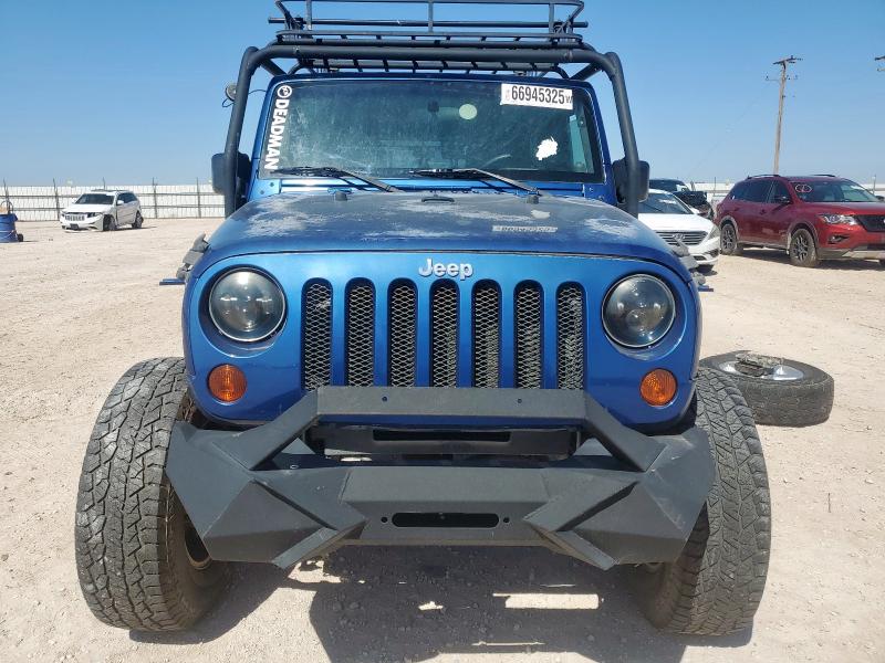 Photo 5 from auction – 2009 JEEP WRANGLER U with VIN 1J8GA69179L712987