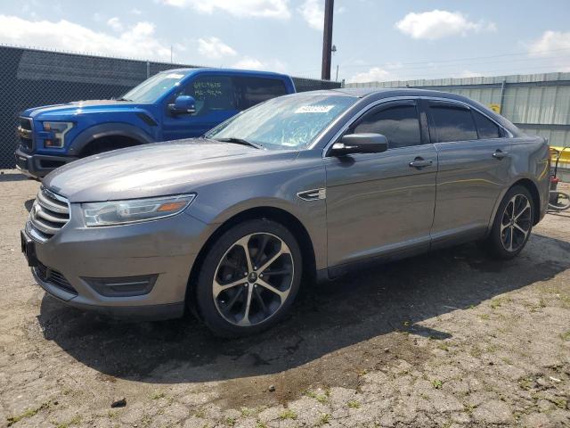 FORD TAURUS SEL 2014 with VIN 1FAHP2E85EG102049 - Photo from auction