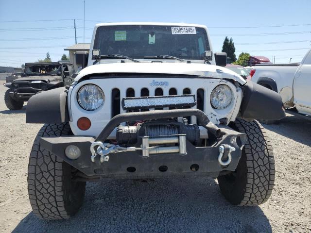 Photo 5 from auction – 2009 JEEP WRANGLER U with VIN 1J4GA39119L771940