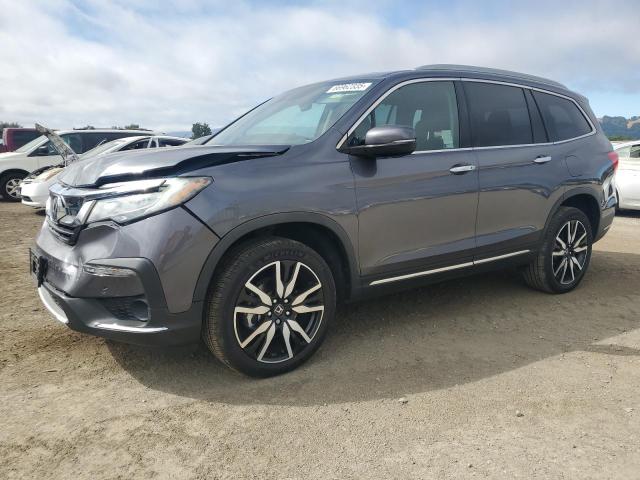 Photo 1 from auction – 2020 HONDA PILOT TOUR with VIN 5FNYF6H66LB009613