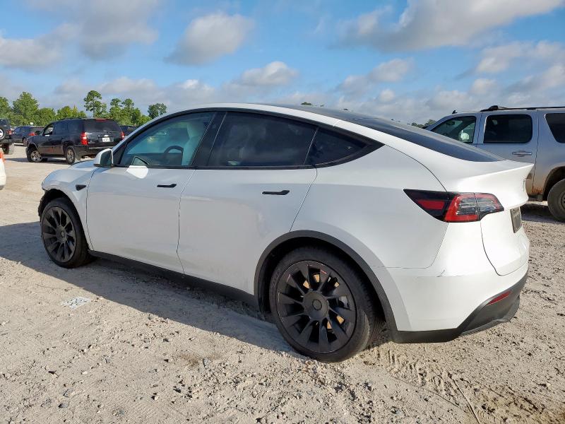 Photo 2 from auction – 2023 TESLA MODEL Y with VIN 7SAYGAEE8PF934639