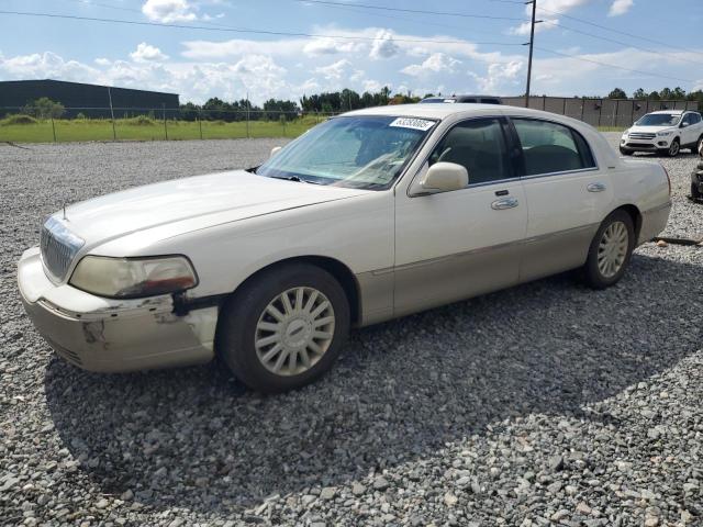 LINCOLN TOWN CAR E 2004 with VIN 1LNHM81W04Y660213 - Photo from auction