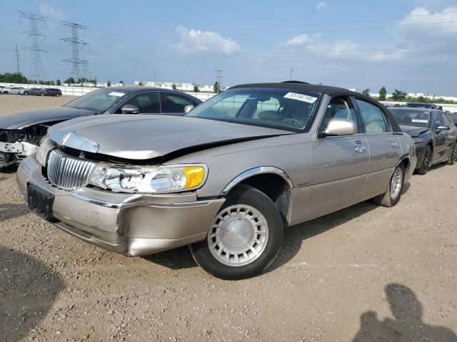 LINCOLN TOWN CAR E 1999 with VIN 1LNHM81W2XY658788 - Photo from auction