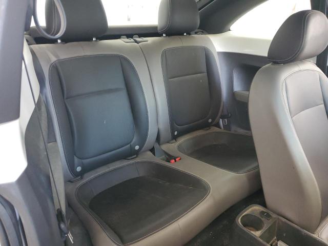 Photo 11 from auction – 2013 VOLKSWAGEN BEETLE with VIN 3VWJX7AT1DM665376