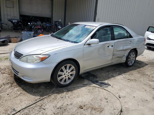 TOYOTA CAMRY LE 2003 with VIN 4T1BE30KX3U764721 - Photo from auction