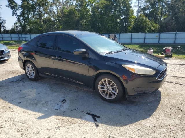 Photo 4 from auction – 2018 FORD FOCUS SE with VIN 1FADP3F24JL308303