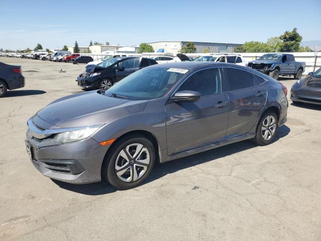 HONDA CIVIC LX 2018 with VIN 2HGFC2F53JH534527 - Photo from auction
