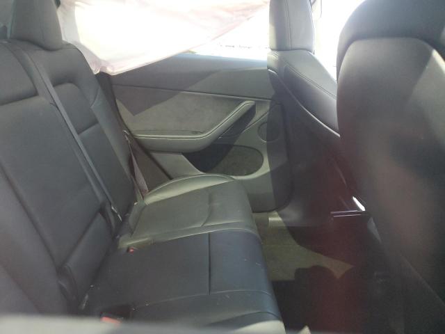 Photo 10 from auction – 2024 TESLA MODEL Y with VIN 7SAYGDEE4RA244338