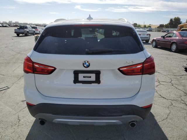 Photo 6 from auction – 2017 BMW X1 XDRIVE2 with VIN WBXHT3C37H5F81471