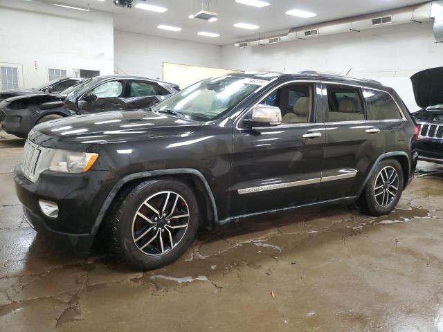 JEEP GRAND CHER 2011 with VIN 1J4RR6GT4BC536171 - Photo from auction