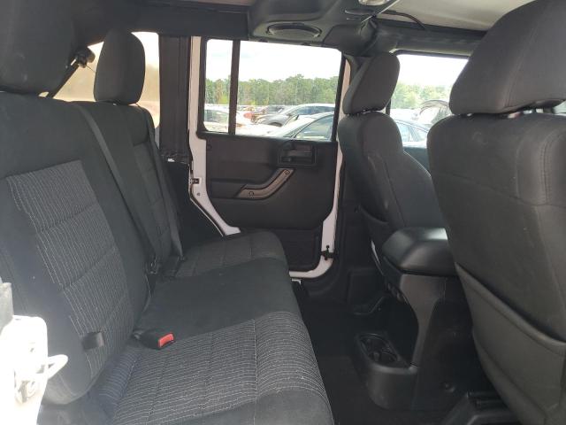 Photo 11 from auction – 2012 JEEP WRANGLER U with VIN 1C4HJWDG8CL214764